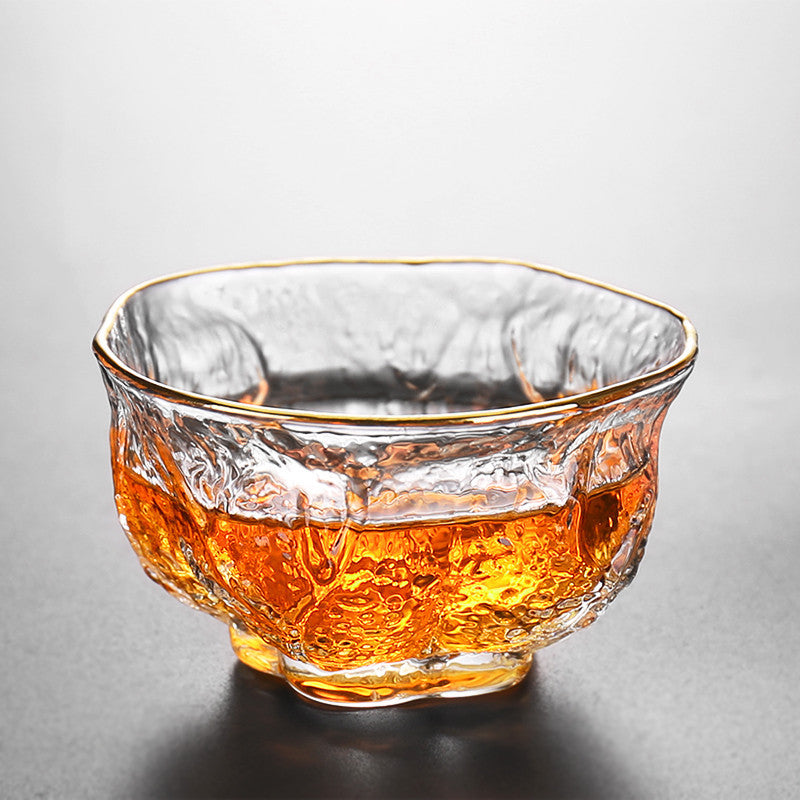 A Stylish And Simple Gold Painted Glass Teacup For Domestic Use