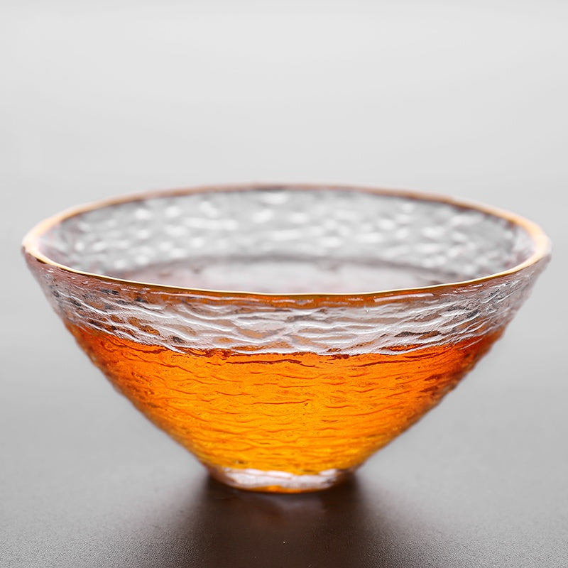 A Stylish And Simple Gold Painted Glass Teacup For Domestic Use